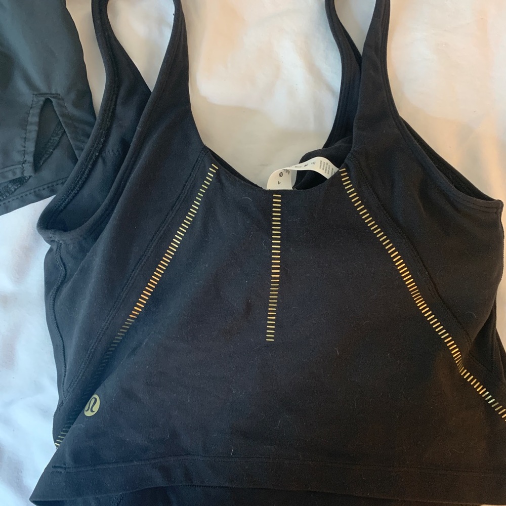 Lulu lemon black crop top with built in bra , never worn, size 4